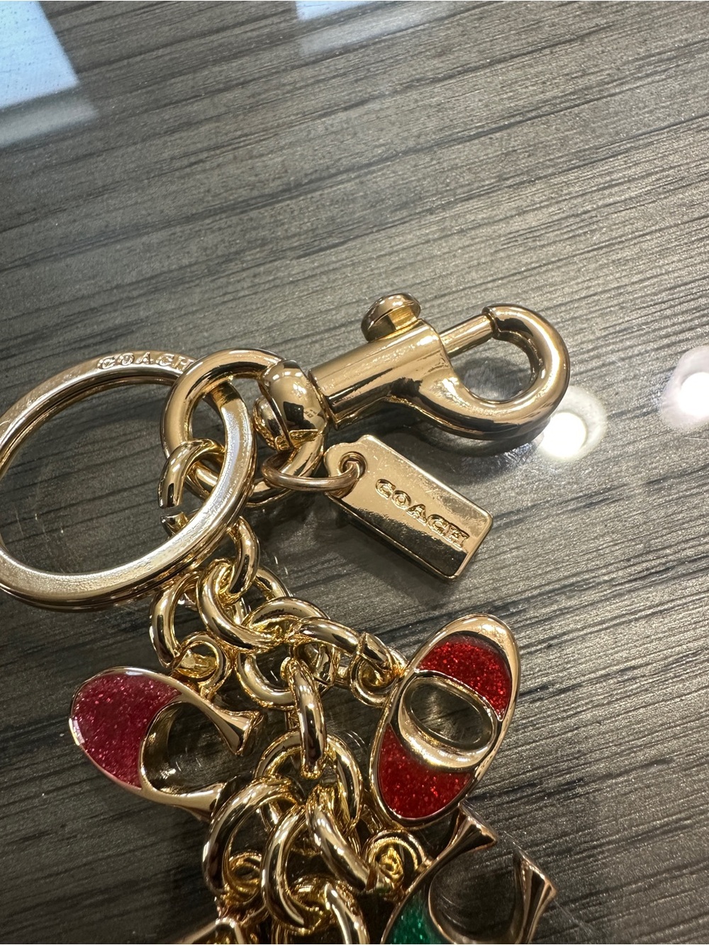 Coach Gold-Tone Keychain with Multicolor Enamel Letter Charms - Picture 2 of 2